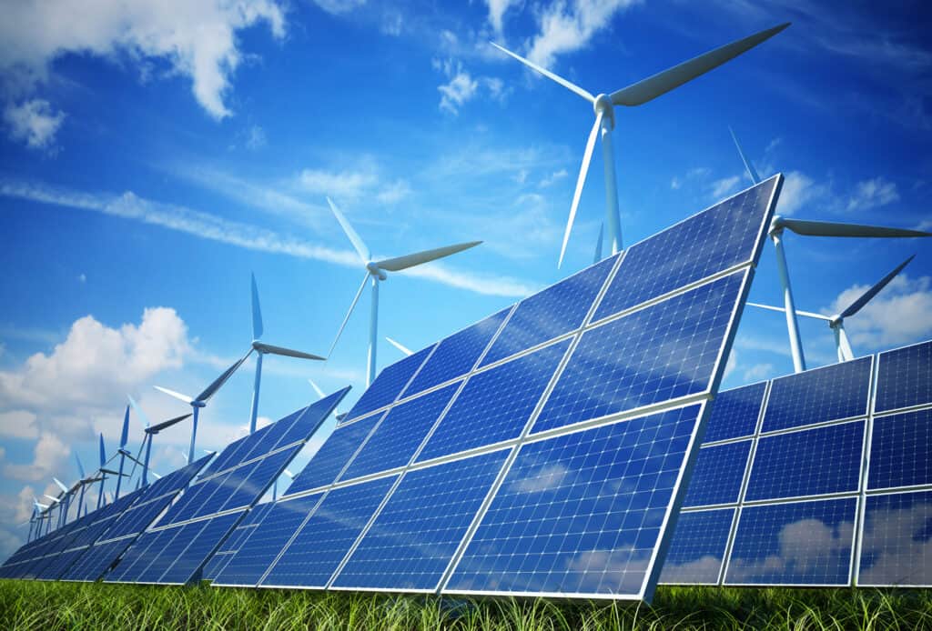 Wind turbines and solar anels in a field